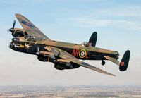 Battle_of_Britain_Memorial_flight_Avro_Lancaster_(cropped)